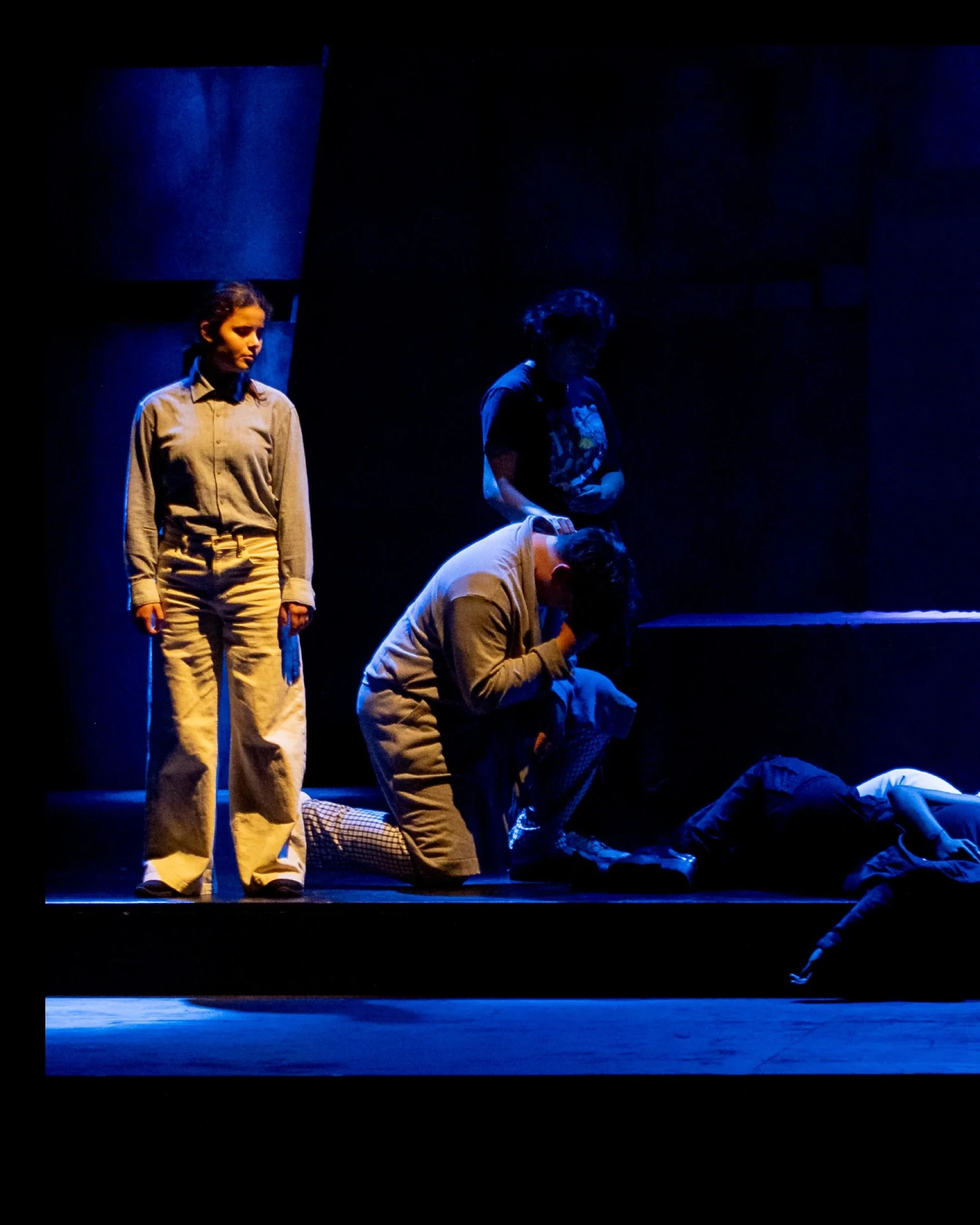 Dramatic scene lit in deep blue side light